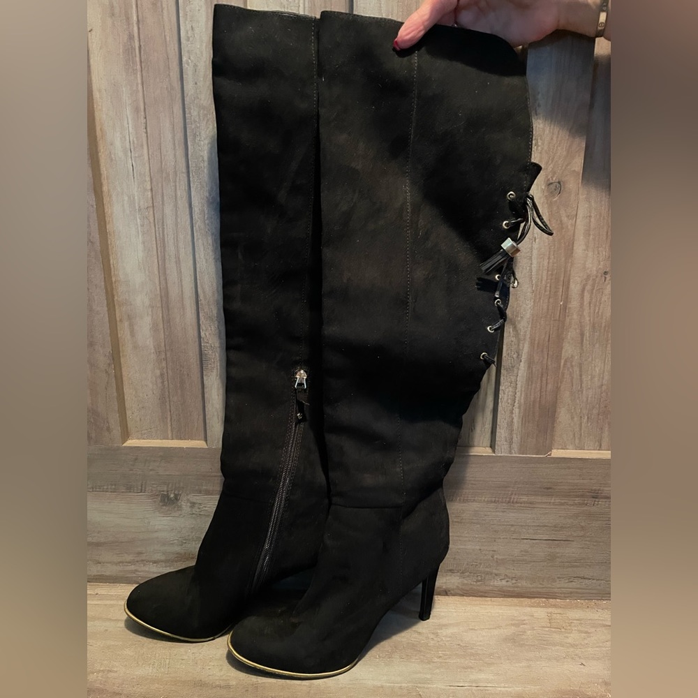 Over the knee black high heeled boots